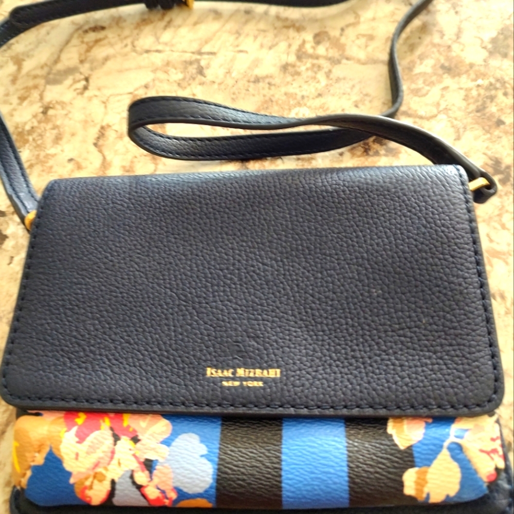 An Issac Mizrahi leather handbag.